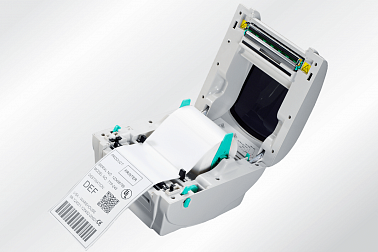 Принтер этикеток TSC TDP-247 с открытой крышкой